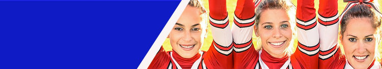 Cheerleaders lined up with arms in the air