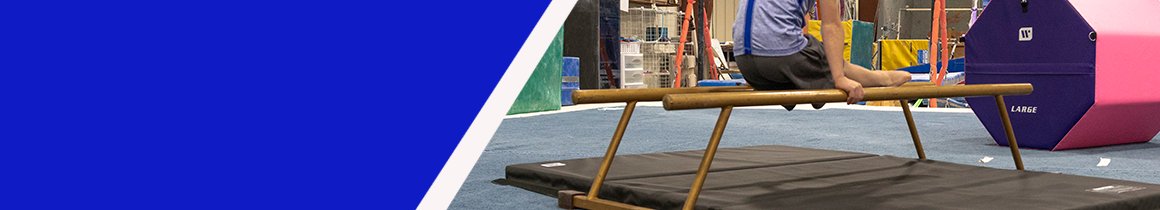 Child practices gymnastics in gym with octagons and multi-purpose mats
